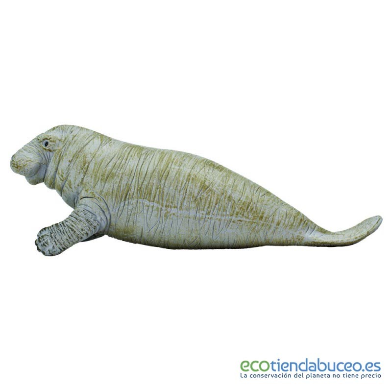 Vaca marina o Dugong de juguete. Una figura de recuerdo de una especie en  peligro.